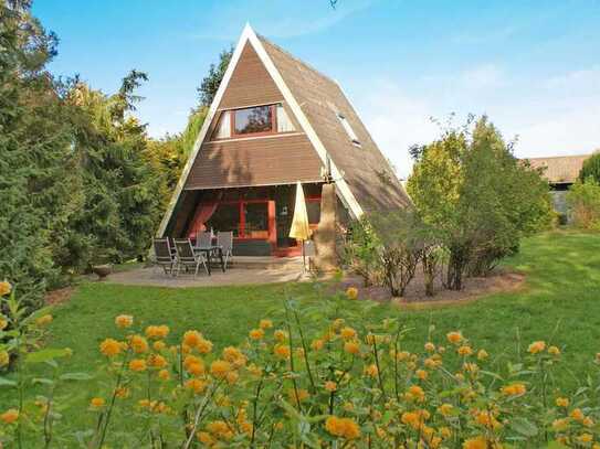 Zeltdachhaus mit grossem Grundstück in Damp zu verkaufen