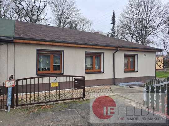 Moderne & gepflegte Doppelhaushälfte im Bungalow-Stil mit Garage, schönem Garten und Werkstatt