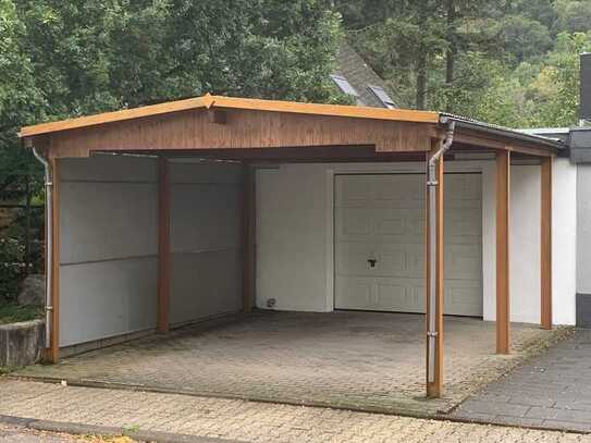 Garage plus Stellplatz und Carport