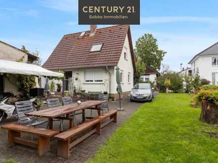 Den Main vor der Tür - weitläufiges Grundstück mit einem charmanten Haus & viel Ausbaupotential!