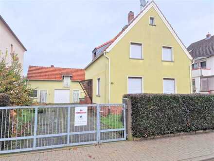 Massiv gebautes Einfamilienhaus mit großem Grundstück und Nebengebäude in Nidderau Heldenbergen