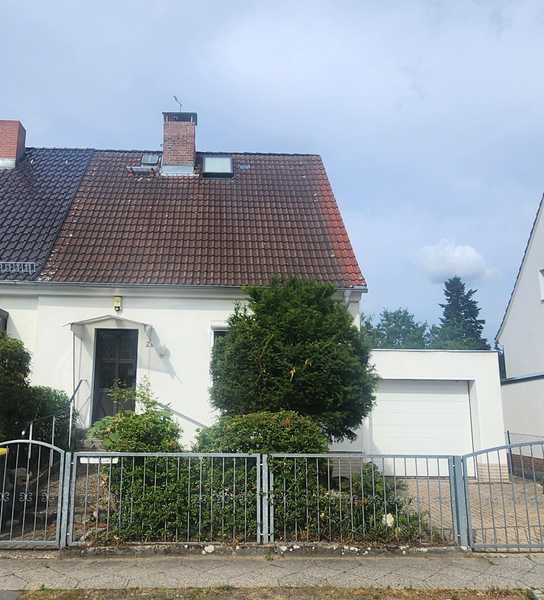 Doppelhaushälfte mit schönem Garten und Garage - Ruhiges Wohnen in zentrumsnaher Lage