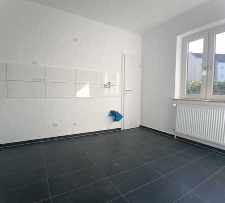 Modernisierte Erdgeschosswohnung im Zentrum der Stadt.