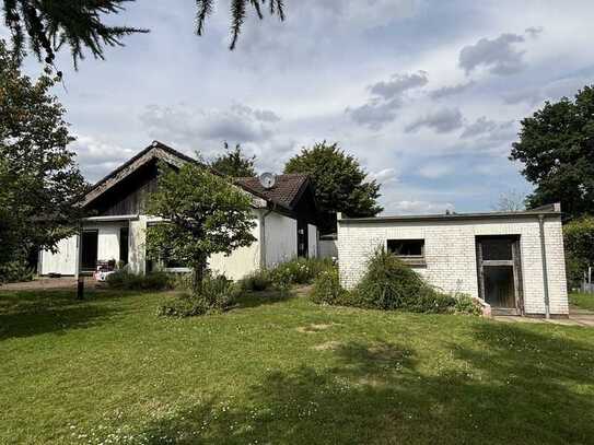 Sanierungsbedürftiger Winkelbungalow auf verkehrsgünstigem, ruhigen Grundstück - Buchholz/Steinbeck