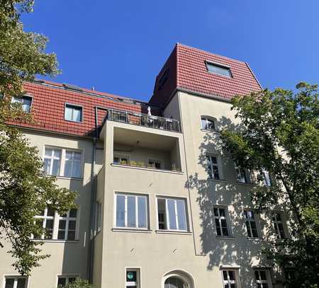 Herrschaftliches Wohnen in saniertem Altbau mit großer Sonnenterrasse und Gemeinschaftsgarten