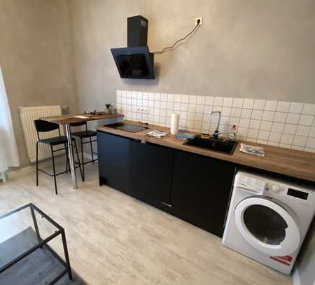 Exklusive möblierte Wohnung mit EBK, Terrasse und Garten