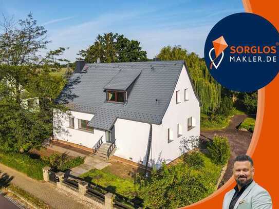 Mitten im Grünen - Einfamilienhaus mit viel Platz und Potenzial für Ihre Wohnträume !