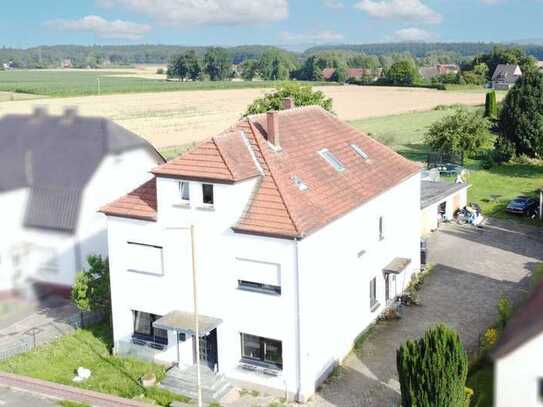 MFH mit viel Platz und Potenzial zur flexiblen Nutzung in grüner Lage von Löhne inklusive Bauplatz