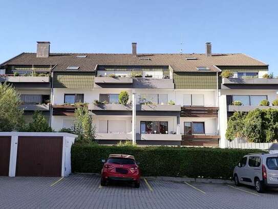 Traumhafte Terrassenwohnung mit eigenem Garten und Garage