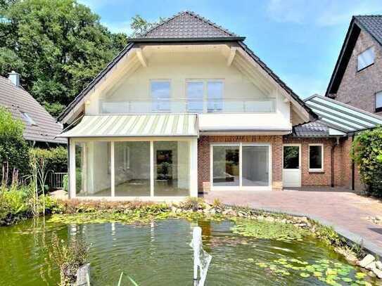 Vollunterkellertes, freistehendes Einfamilienhaus mit Garage und Carport in ruhiger Lage