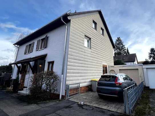 Familiengerechte Doppelhaushälfte mit Garage, Fernwärmeheizung, in beliebter Wohnlage samt sehr gute