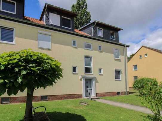 Haus-im-Haus-Flair mit Garten: Renovierungsbedürftige Maisonettewohnung in der Nähe des VW-Werks