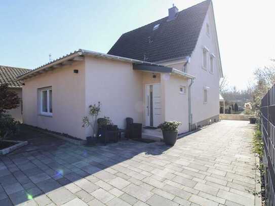 Modernes Einfamilienhaus mit Garage und Traumgarten – Naturnah Wohnen in Maintal!
