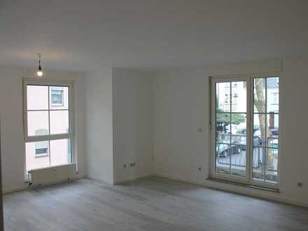 Charmantes Apartment im ersten Obergeschoss mit Balkon und TG-Stellplatz im schönen Hassels