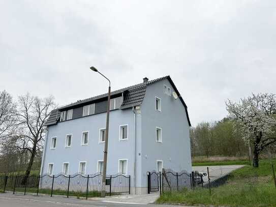 NEU - Erstbezug in einem kleinen 3-Familienhaus mit Terrasse und Garten