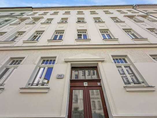 Gepflegte 3-Zimmer-Wohnung mit Parkett, Balkon und Gartenanteil in ruhiger Seitenstraße