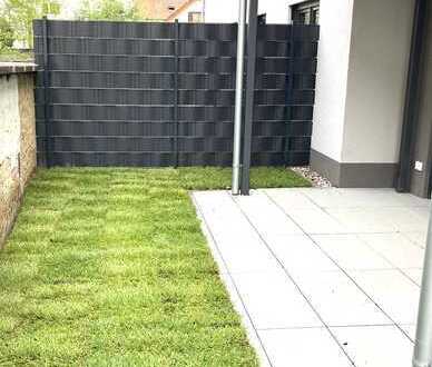 Neubau! Exklusive 3 Zi.- Gartenwohnung mit Wärmepumpe, KFW 55, Solar!