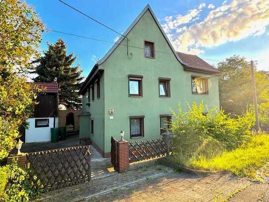 Einfamilienhaus im Dornröschenschlaf mit großer Scheune, Doppelgarage und traumhafter Gartenoase