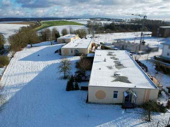 Attraktive Kapitalanlage: Drei modernisierte Mehrfamilienhäuser mit ca. 985 m² Wohnfläche