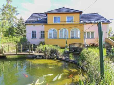 Alle unter einem Dach: Großzügiges Einfamilienhaus mit Einliegerwohnung und Nebengelassen zum Ausbau