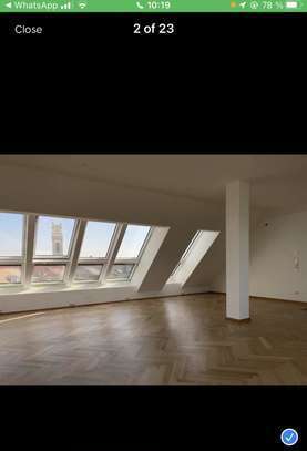 Wunderschöne Dachgeschoss Maisonettewohnung mit Blick auf die Alpen und auf München