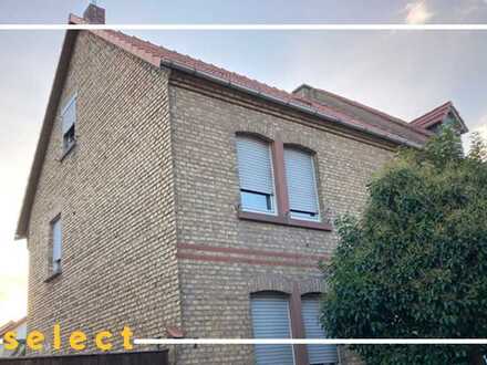 Zwei-Parteienhaus mit genehmigtem Anbau und DG-Ausbau