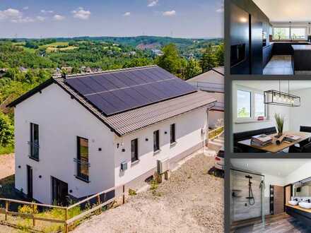 Modernes und autarkes Einfamilienhaus mit unverbaubarem Blick über Wiesen und Felder
