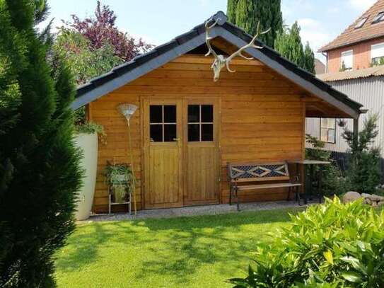 Großzügige Erdgeschosswohnung mit Terrasse und Gartenanteil