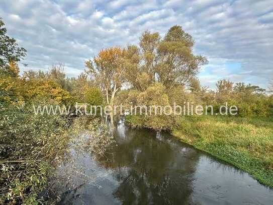 Baugrundstück (2024 m²) inkl. Baugenehmigung für 4 EFH in romantischer Wasserlage von Halle (Saale)