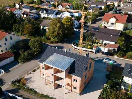Neubau eines modernen Mehrfamilienhauses mit Stellplätzen in Buxheim
