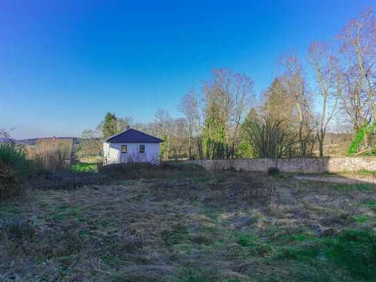 BAUPLATZ MIT TRAUMHAFTEM AUSBLICK ÜBER DÄCHER UND WÄLDER IN SCHÖNER WOHNLAGE VON TRIPPSTADT