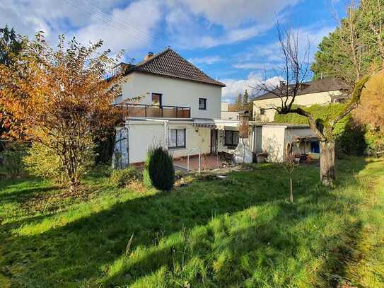 Schönes Einfamilienhaus mit Garage und Garten in bester Lage!