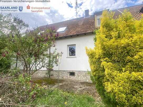 Einfamilienhaus mit Garage plus Bauplatz!