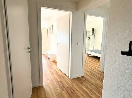 Teilmöbliertes, Modernisiertes 2-Zimmer-Appartment mit EBK und Panoramablick in Bahnhofsnähe