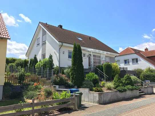 3,5 Zimmer Erdgeschosswohnung mit Garten und Süd-Terrasse in 2 Familienhaus.