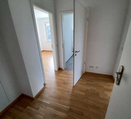 **Schöne 2-Zimmer-Wohnung im 1. Obergeschoss mit Balkon und Küche**