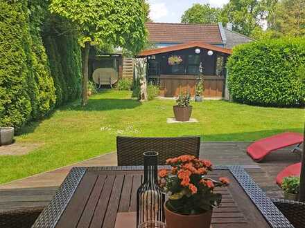 Äußerst charmante und geräumige DHH mit idyllischem & sonnigen Garten!