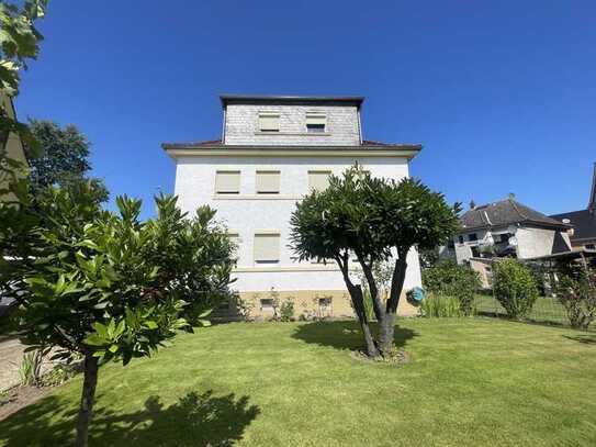 Gehobenes Mehrfamilienhaus mit großem Garten mitten in Rüsselsheim am Main