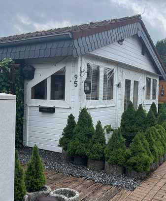 Solides BOTS Ferien-Holzblockhaus an der Xantener Nordsee auf einem Pachtgrundstück