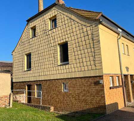 Schöne Eigentumswohnung - Reihenendhaus in ruhiger Lage mit Garten und Schuppen