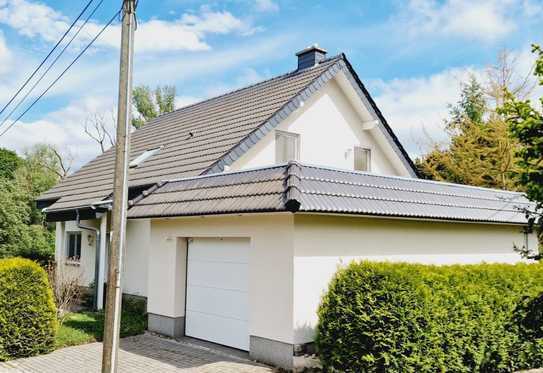 Einfamilienhaus im Grünen: Harmonie zwischen Natur und modernem Komfort