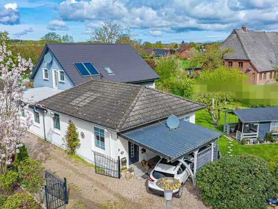 Vielseitiges Raumwunder mit Weitblick - modernisiertes Einfamilienhaus mit Einliegerwohnung