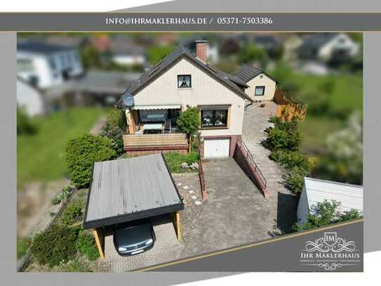Einfamilienhaus mit ausgebautem Dachgeschoss und Nebengebäude auf großzügigem Grundstück!
