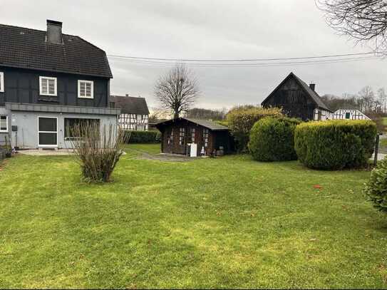 Erdgeschosswohnung mit Gartennutzung und Gartenhaus per sofort