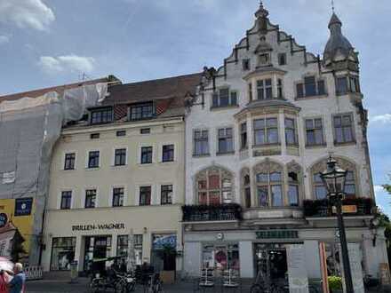 Sonnige 1-Zimmer-Wohnung am Marktplatz mit Stellplatz & Garten