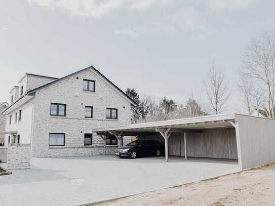 Neubau: Stilvolle 2-Zimmer-Erdgeschosswohnung mit Terrasse und Keller in Großenaspe