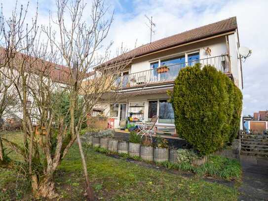 3-Familienhaus mit großem Garten, Garage und Stellplätze in grüner Wohnlage