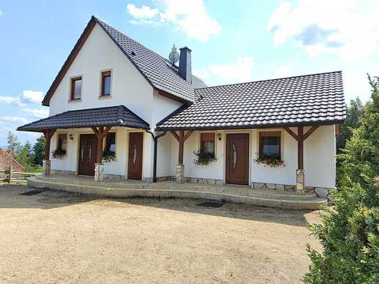 Architektenhaus mit Einliegerwohnung und Terrasse in herrlicher Natur