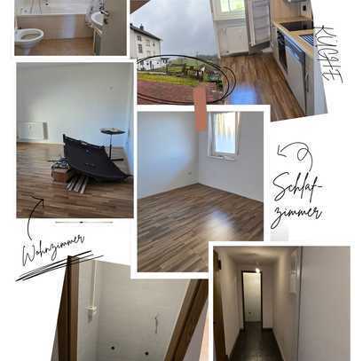 2-Zimmer-Wohnung mit großer Terrasse & Gartennutzung in Urschmitt – ab sofort bezugsfrei