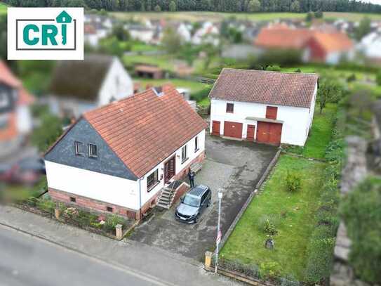 Einfamilienhaus mit Scheune und großem Garten in idyllischer Lage